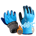 Men’s waterproof winter work gloves in blue and black with thermal insulation and fuzzy gray cuff for extreme cold