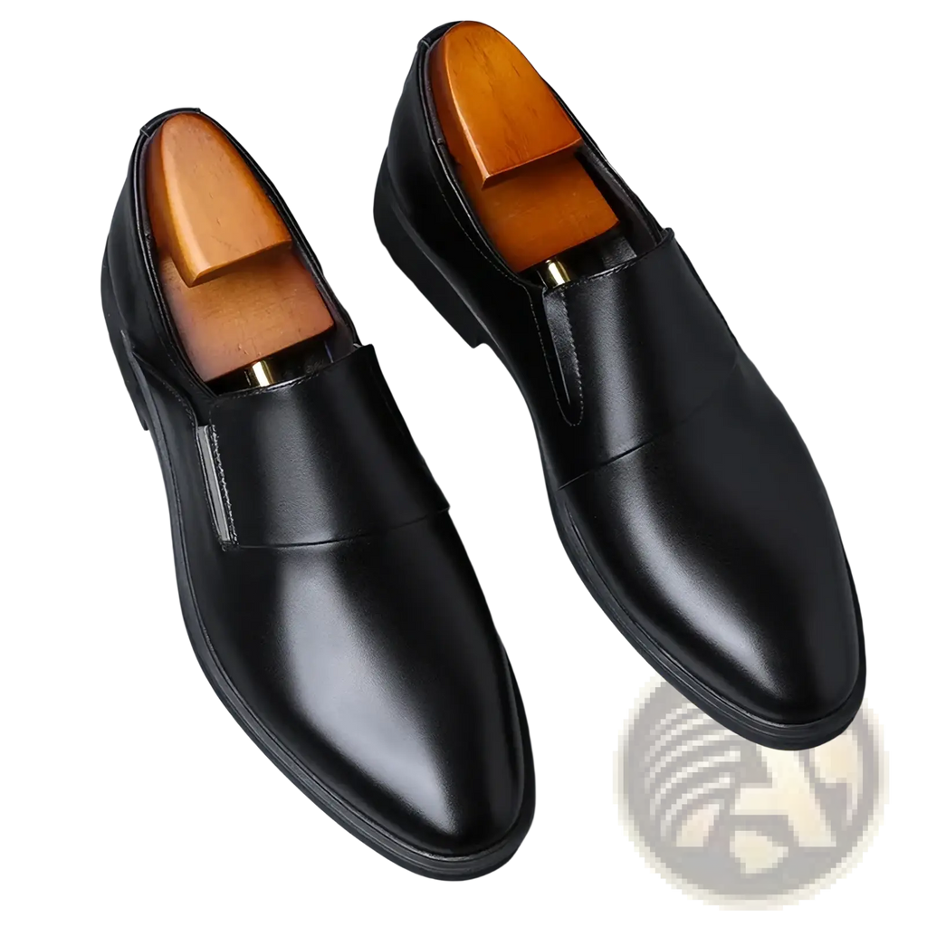 Black leather slip-on men’s dress shoes with polished finish and wooden insoles for formal occasions