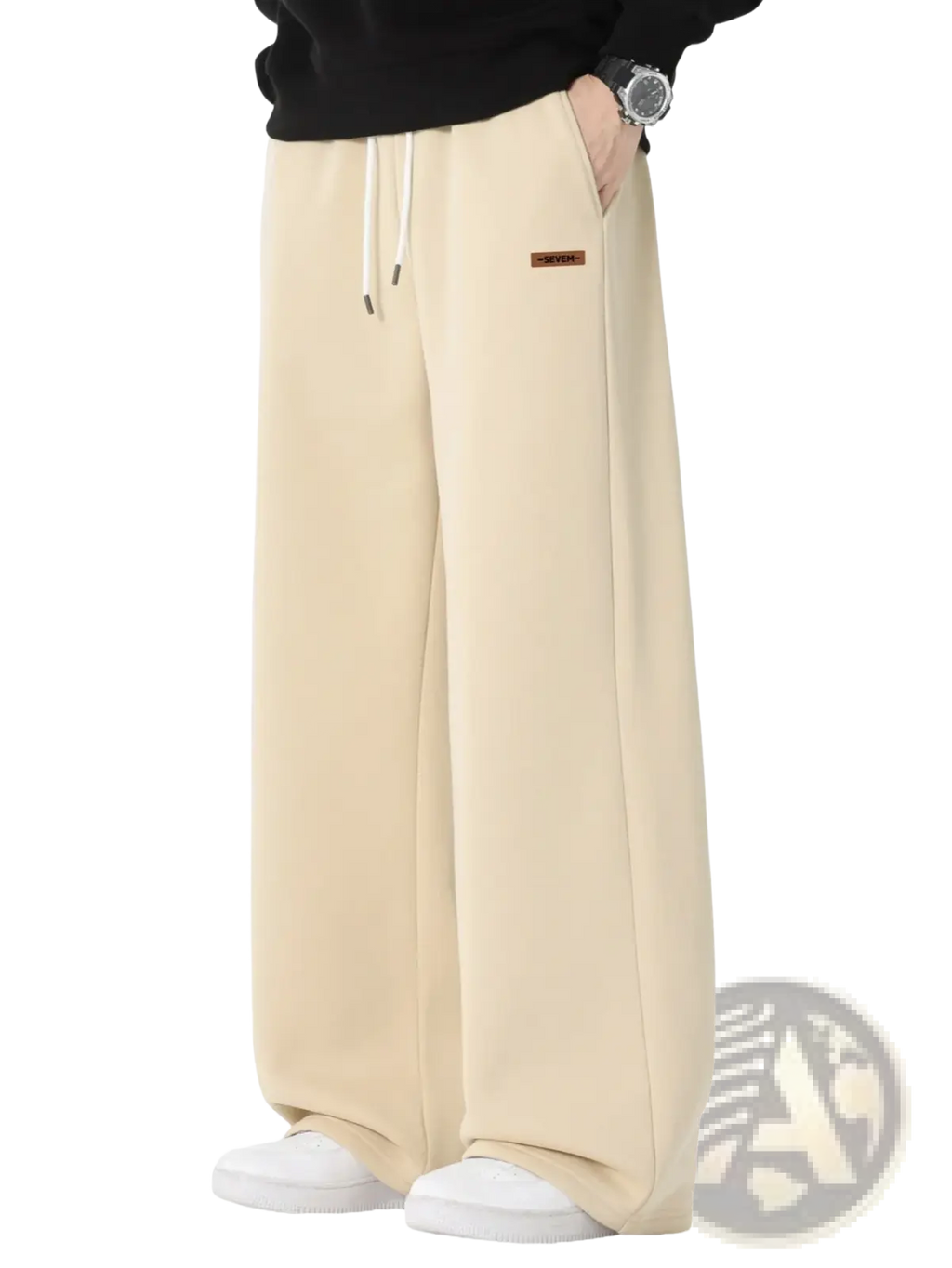 Men’s cream-colored wide leg drawstring sweatpants with a loose fit and brown brand patch on the left thigh