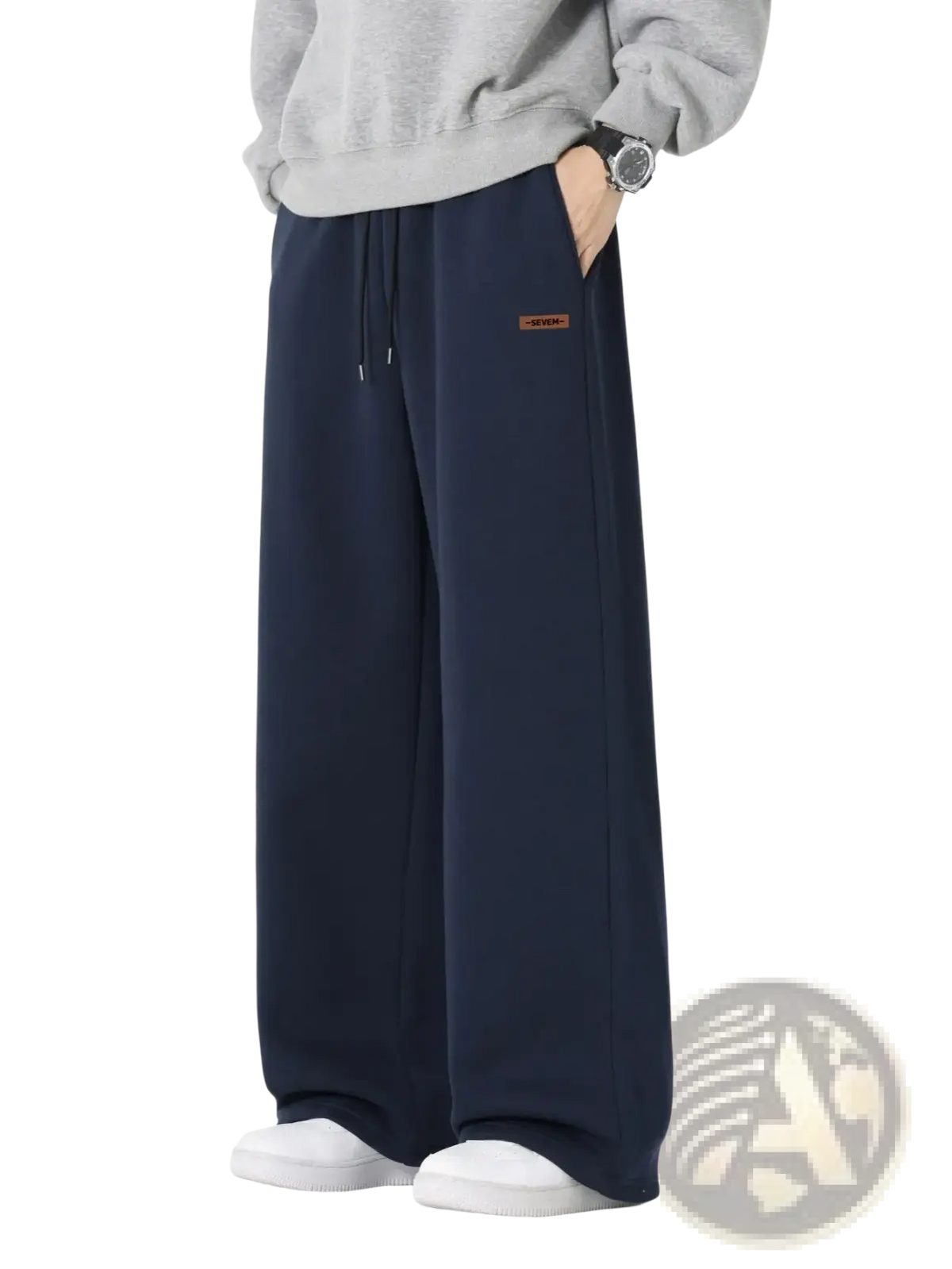 Navy blue men’s wide leg drawstring sweatpants with brown label on left thigh designed for casual wear