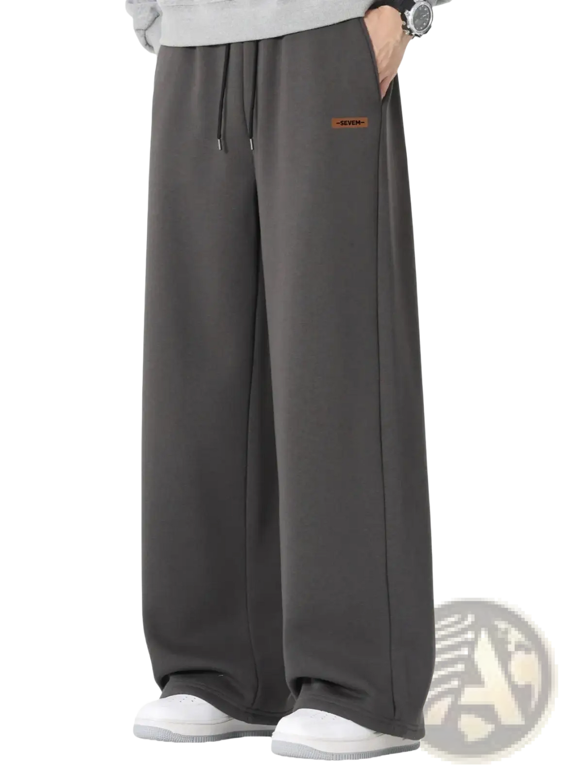 Men’s wide leg dark gray cotton sweatpants with drawstring waistband and small brown patch on left leg for casual wear