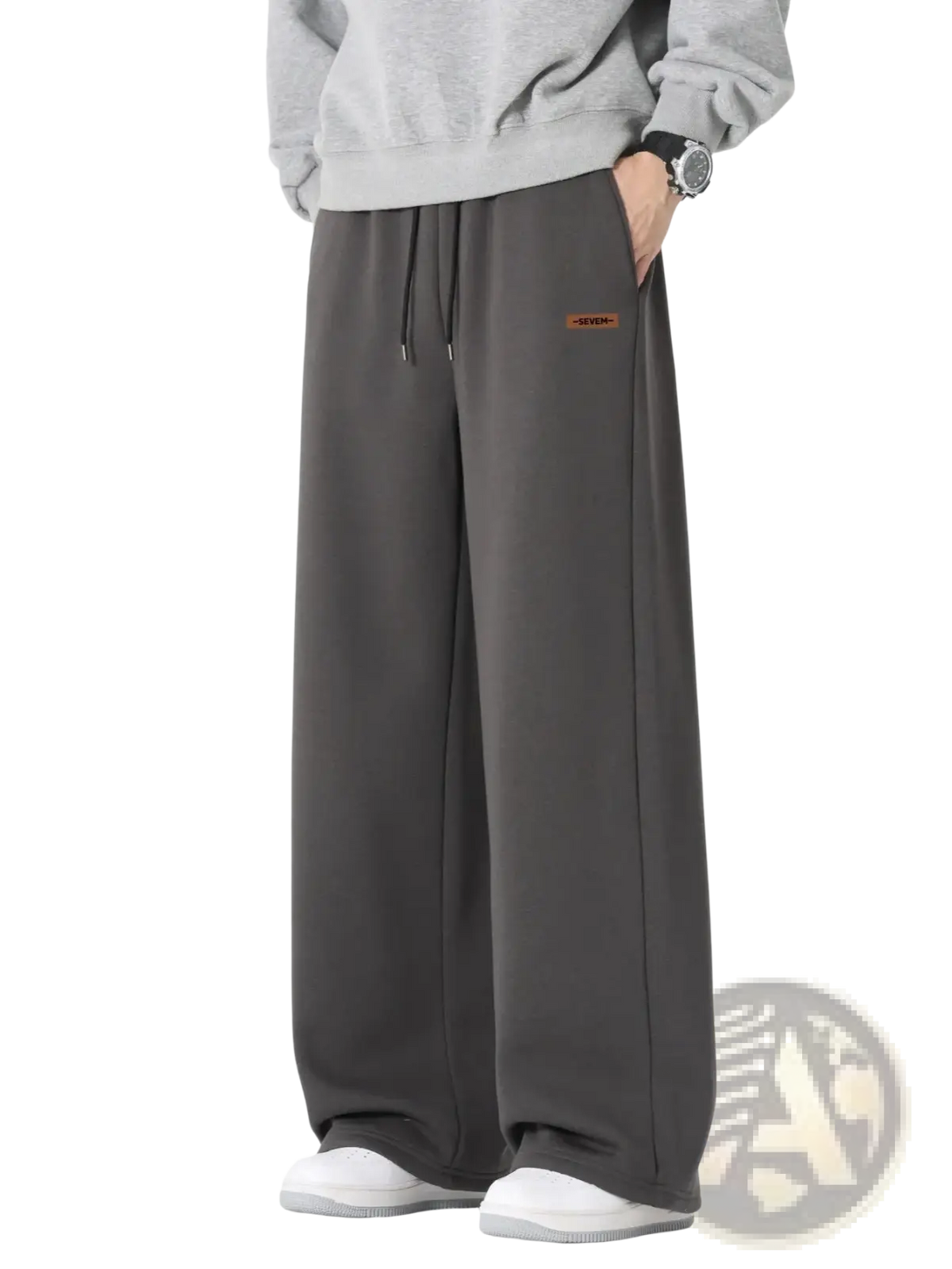 Men’s dark gray wide leg drawstring sweatpants with a loose fit and small brown label on left thigh for casual wear