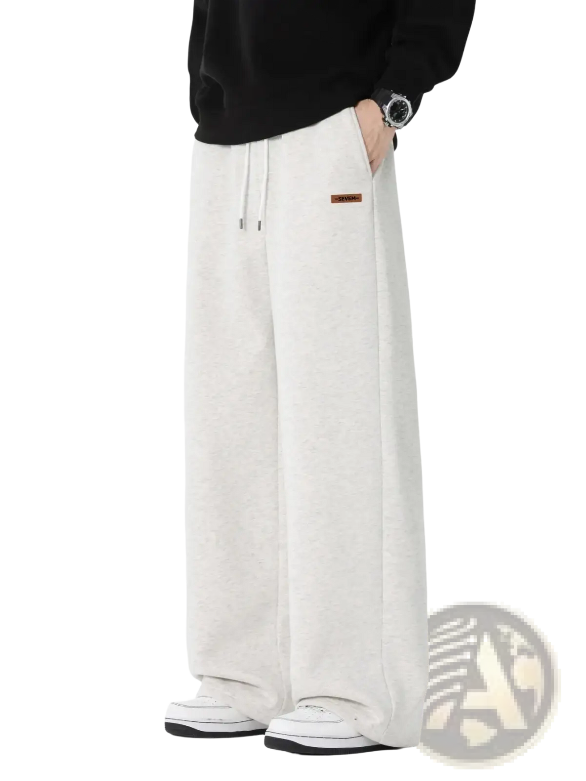 Men’s cream-colored wide leg drawstring sweatpants with a loose fit and brown label on the side pocket for casual wear