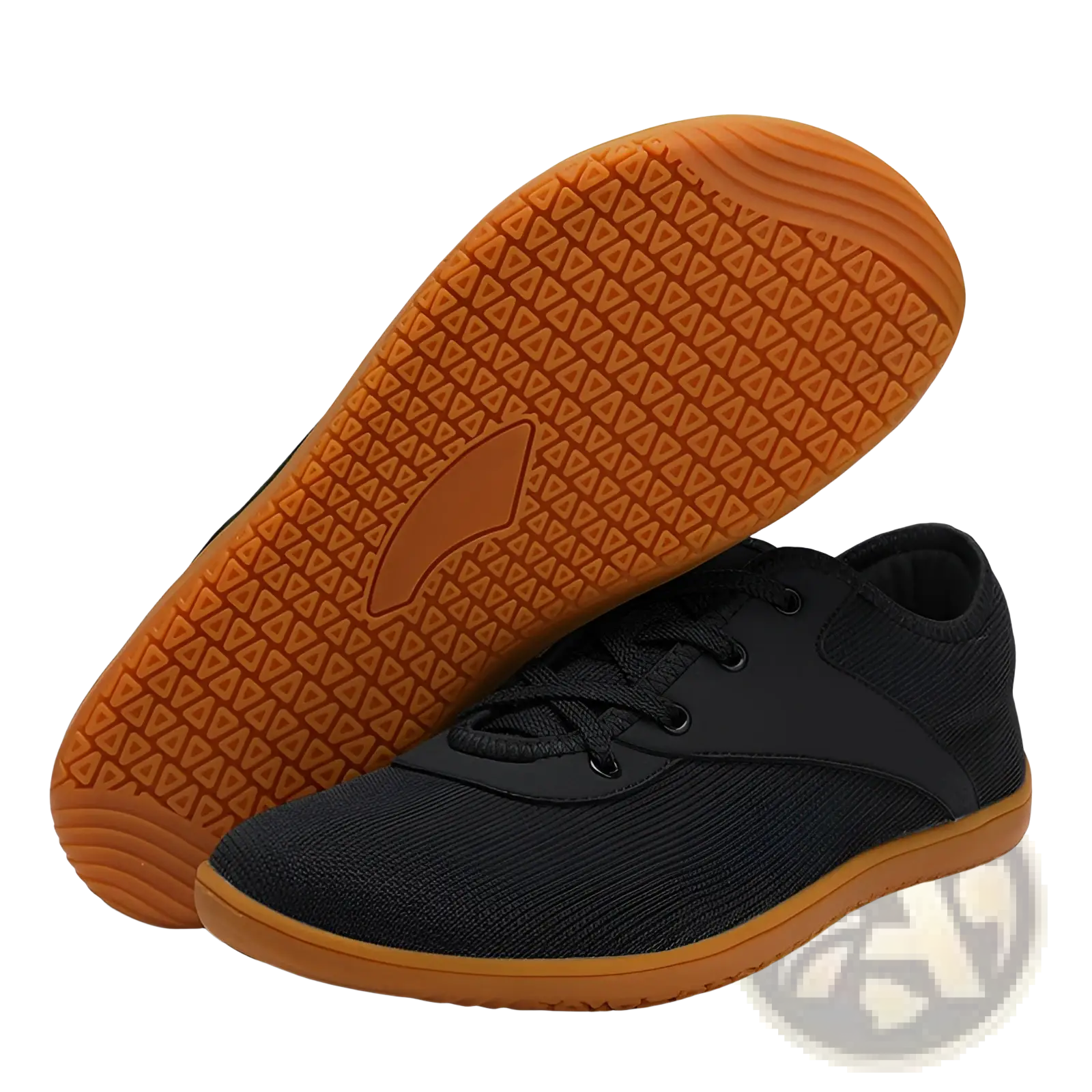 Men’s wide toe breathable mesh running sneakers in black with tan rubber sole and triangular tread pattern