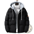 Black men’s winter windproof layered puffer jacket with gray fleece-lined hood and orange sleeve patch