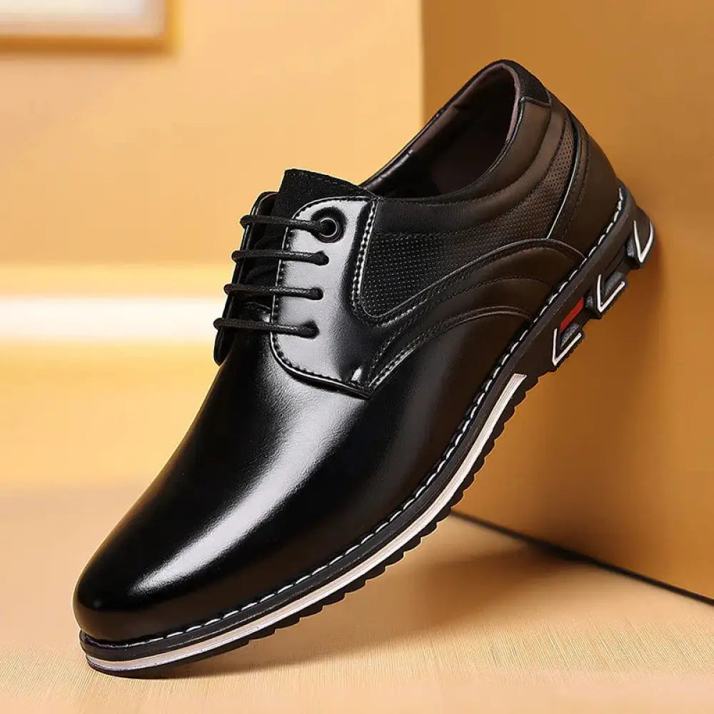 Men’s brown polished leather lace up work shoes with black leather lace-up dress shoe featuring glossy finish and white stitching