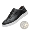 Men’s woven leather casual sneaker in black with a woven texture on the side and a white rubber sole