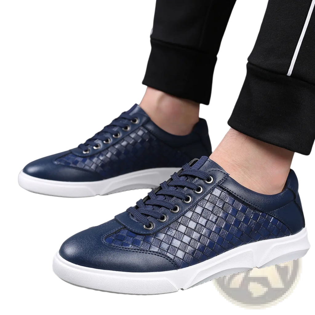 Navy blue men’s woven leather casual sneakers with white rubber soles and black accents for everyday wear
