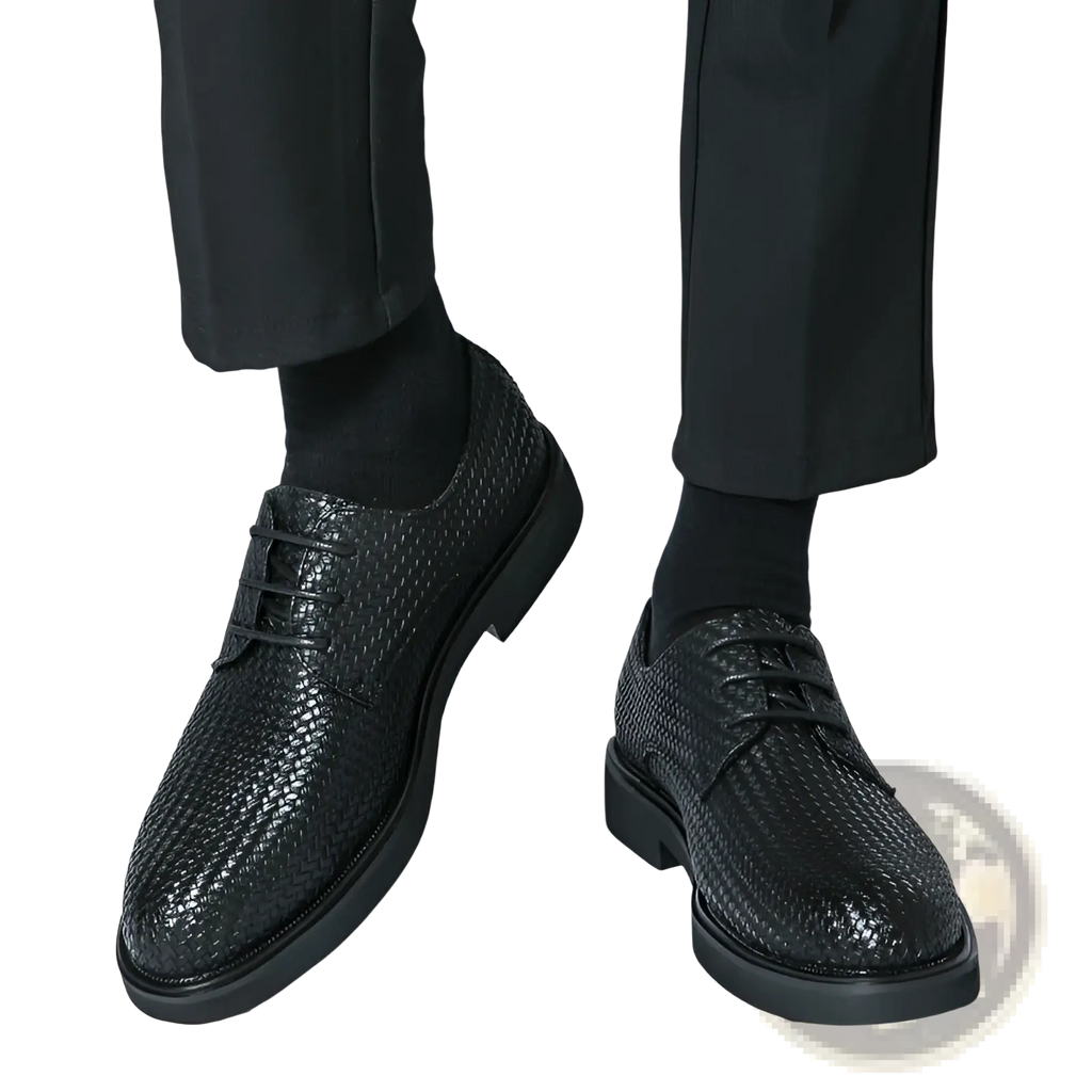 Men’s black woven leather platform British dress shoes with textured upper and thick lace-up soles