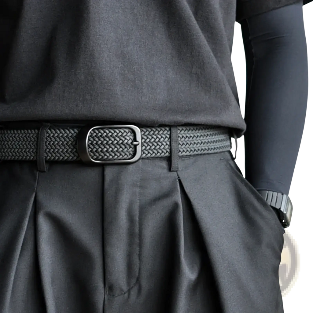 Black woven mens stretch belt with matte metal buckle made of casual canvas for golf and everyday wear