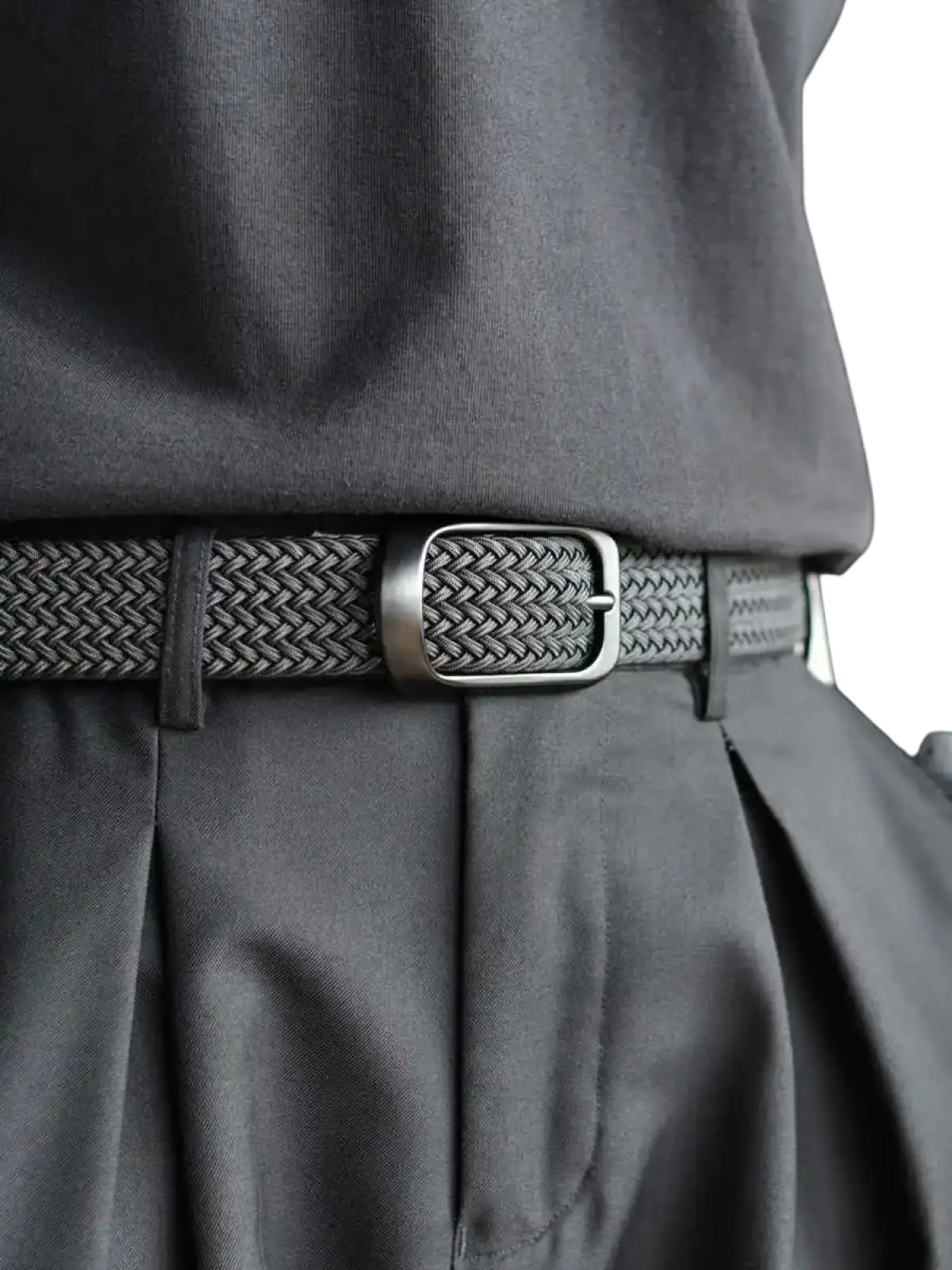 Mens woven stretch belt 4 pack featuring a sleek black woven canvas belt with a matte silver rectangular buckle