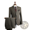 A tailored charcoal gray wrinkle-resistant men’s professional suit with matching vest trousers maroon tie and pocket square