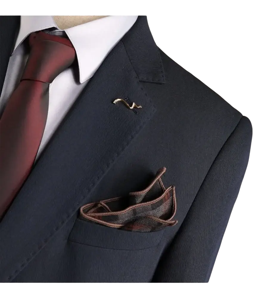Dark navy men’s wrinkle-resistant professional suit jacket with matching brown and gray plaid pocket square and gold pin