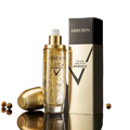 Mercilen moisturizing facial serum 120ml in transparent glass bottle with gold pump and golden wire particles suspended