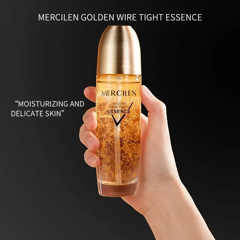 Mercilen moisturizing facial serum 120ml in a transparent glass bottle with golden wire strands and a gold metallic cap