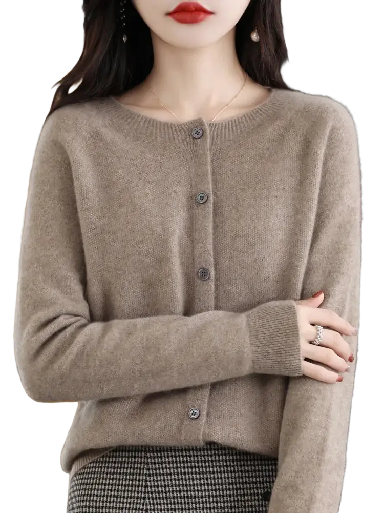 A soft beige cashmere knit merino wool cardigan for women with round neckline and button closure