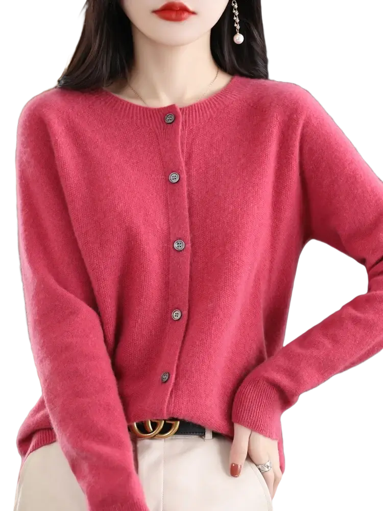 A soft vibrant pink merino wool cardigan for women featuring cashmere knit and five metallic buttons with round neckline