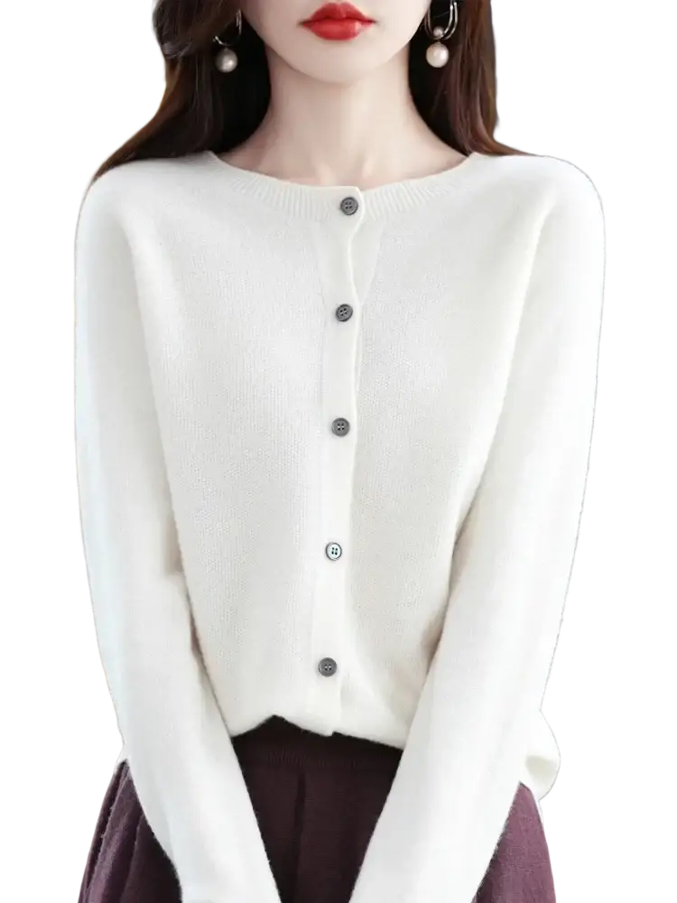 A soft white merino wool cardigan with a round neckline and five dark gray buttons down the front