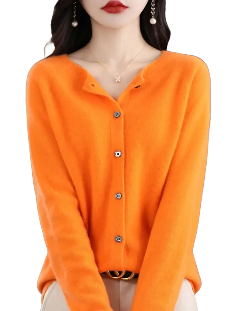 Vibrant orange merino wool cardigan for women with long sleeves, soft fuzzy texture, and silver-toned buttons