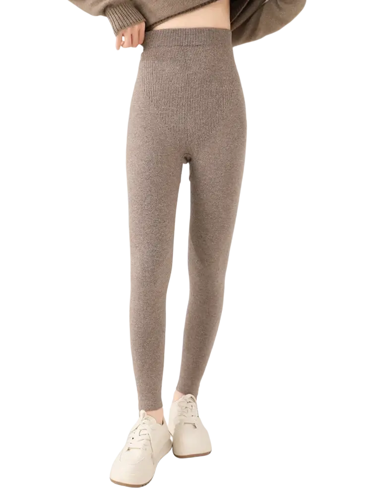 Beige high waisted ribbed leggings made from merino wool featuring a knit texture ideal for comfort and style