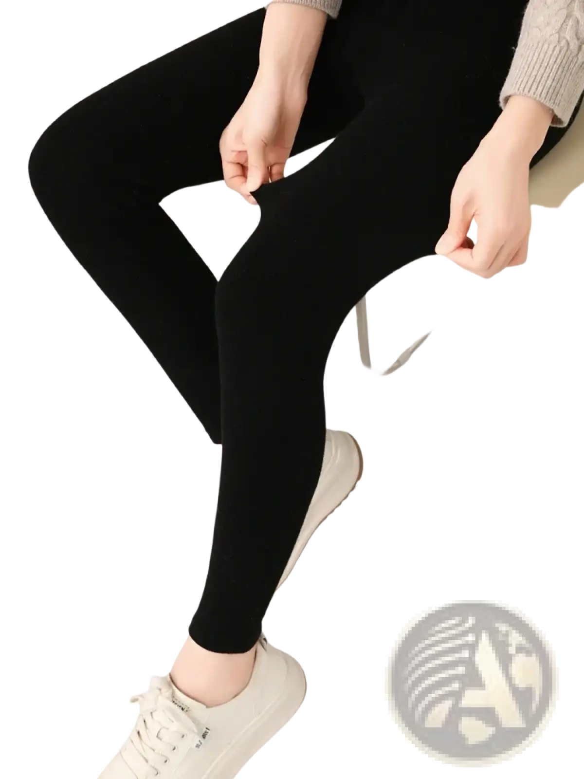 Black high waisted ribbed leggings made of stretchy merino wool fabric for comfortable form fitting wear