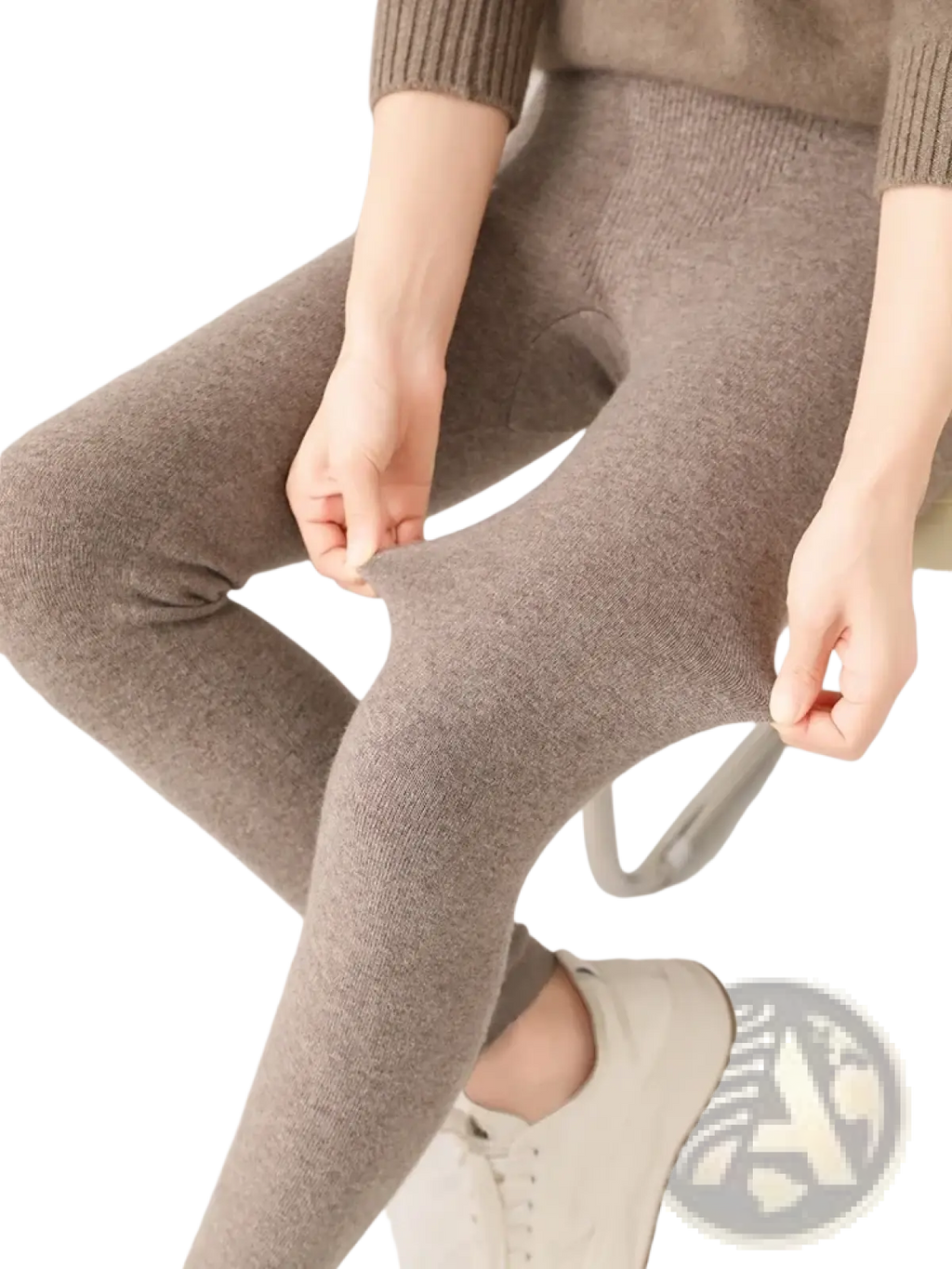 Warm taupe merino wool high waisted leggings with a seamless design and ribbed cuff for comfortable wear