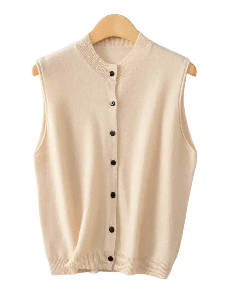 Beige merino wool knit vest for women featuring sleeveless design black buttons and a round neckline