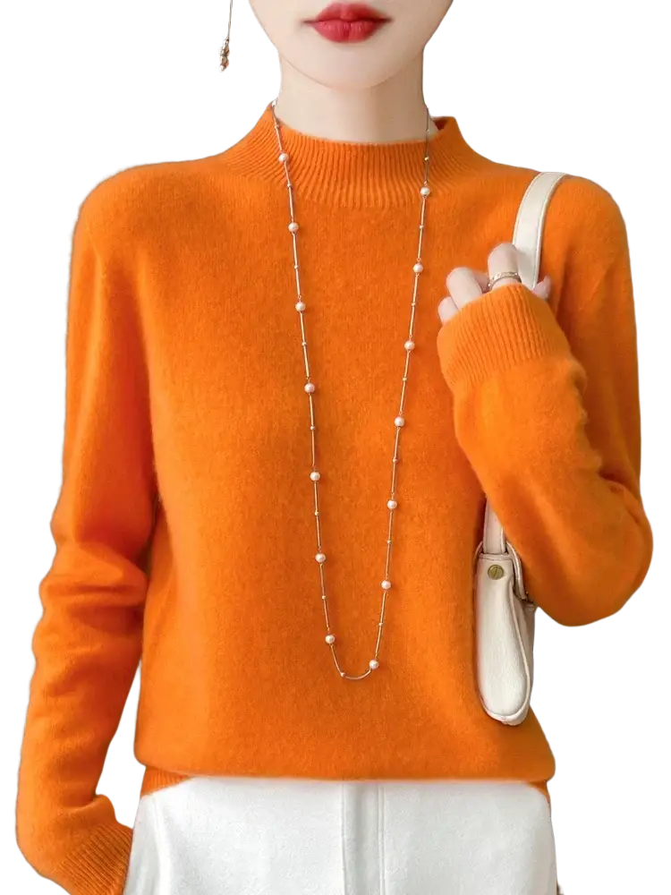 Vibrant orange merino wool pullover sweater for women with high neck soft fluffy texture and ribbed cuffs