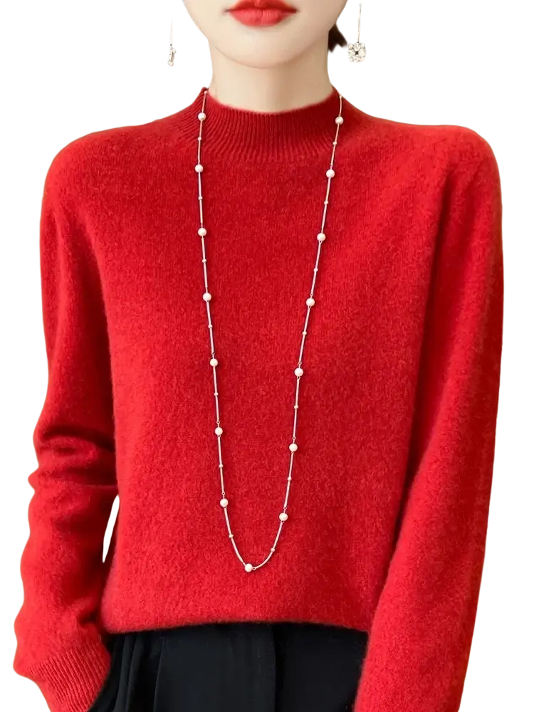 A vibrant red merino wool pullover sweater for women with long sleeves and a high neckline in soft textured fabric