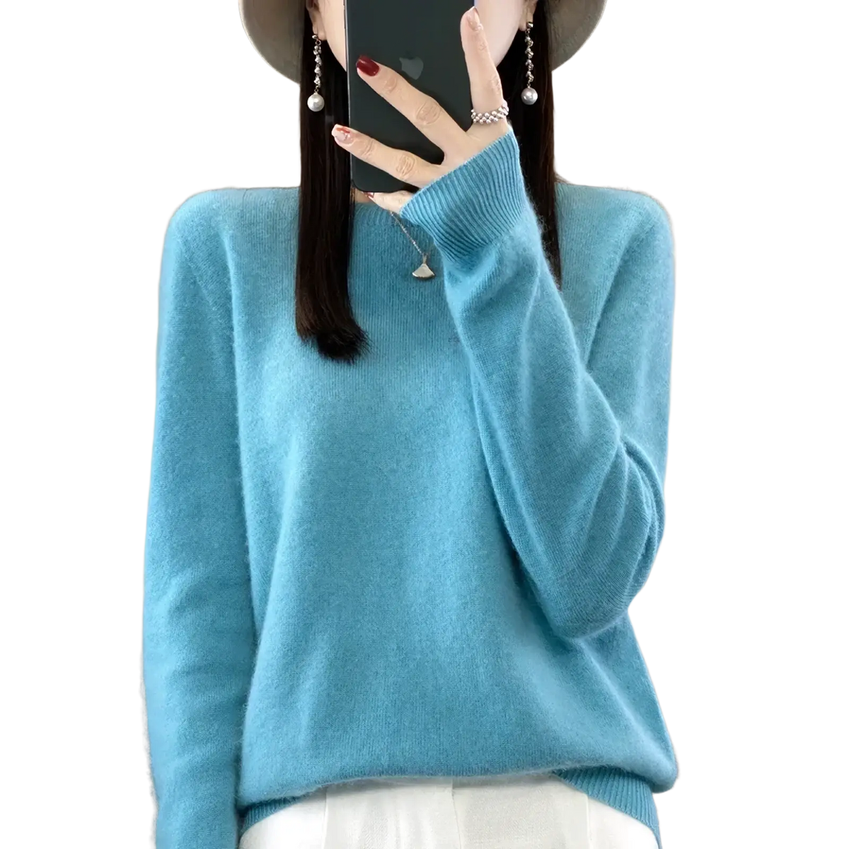 A soft light blue merino wool sweater women o-neck pullover with cozy knit texture and ribbed cuffs