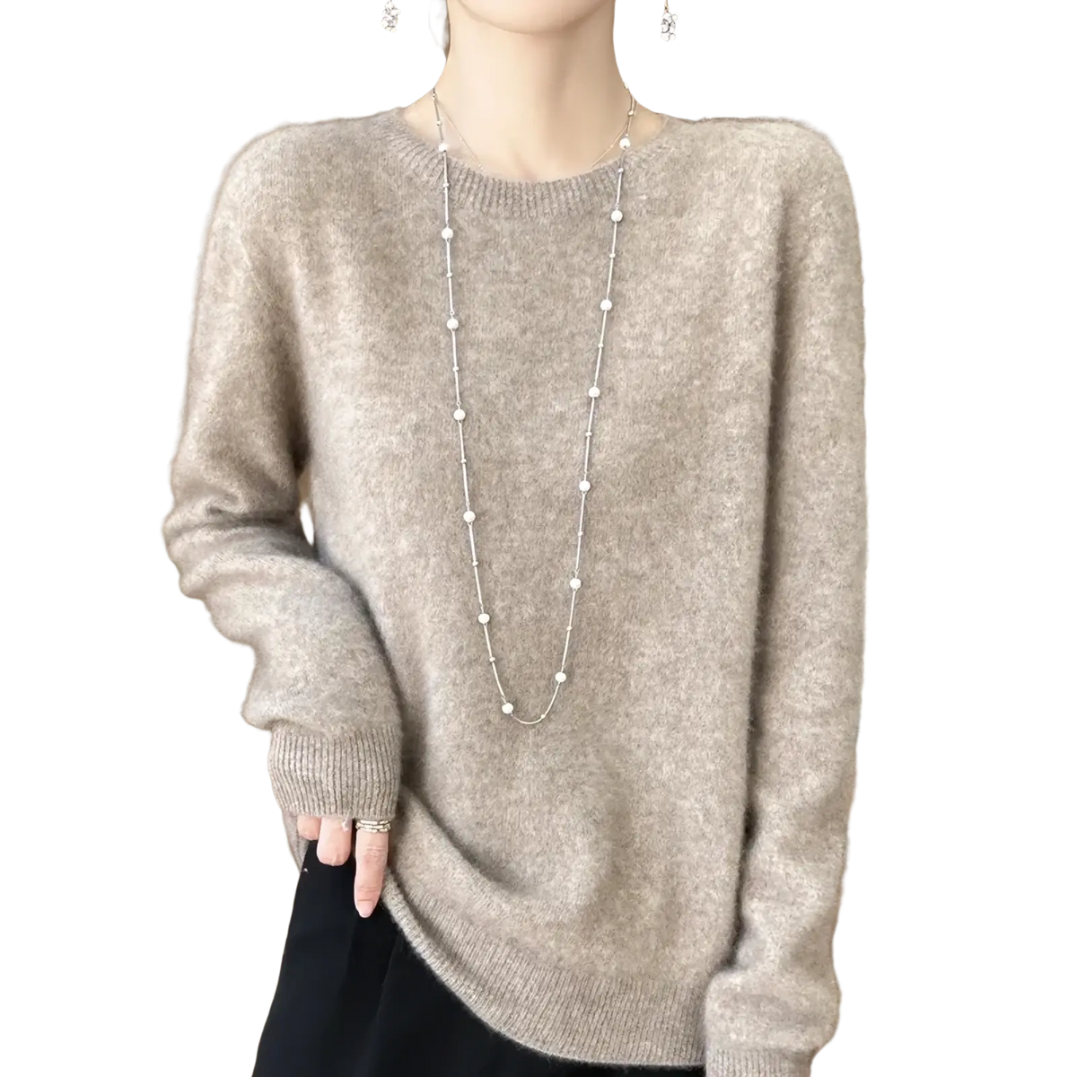 A soft light gray merino wool sweater for women with an o-neck pullover and ribbed cuffs