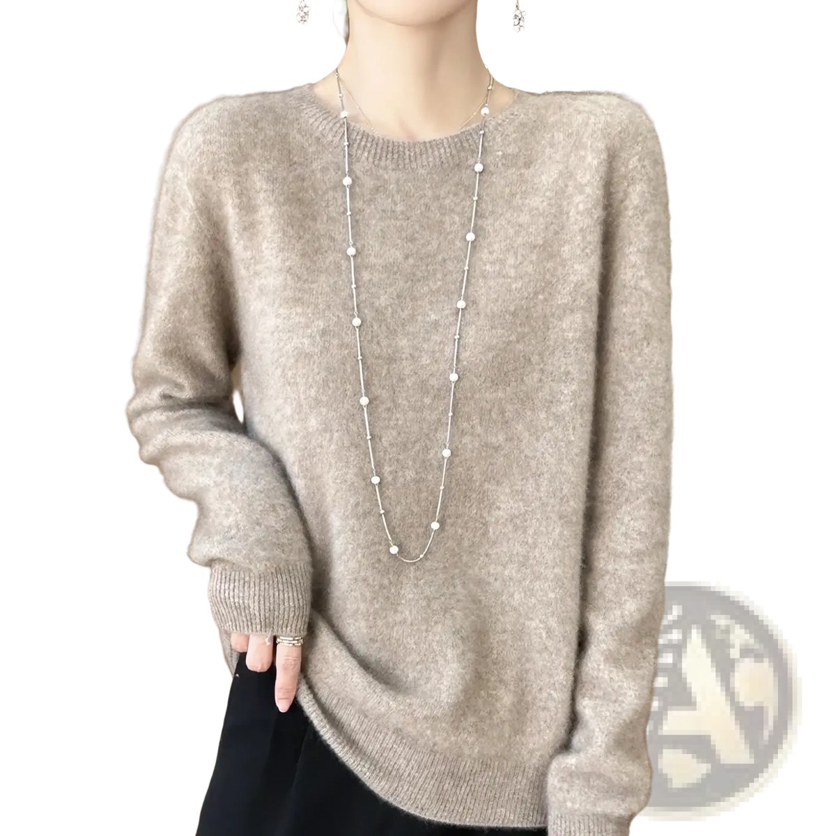 A soft light gray merino wool sweater for women with an o-neck pullover and ribbed cuffs