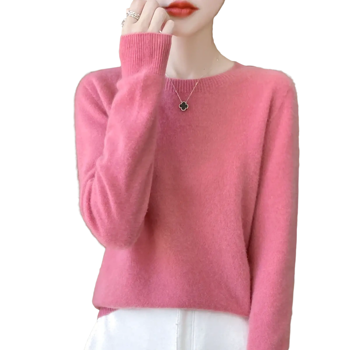 A soft pink merino wool sweater for women with long sleeves, o-neck pullover, and ribbed cuffs