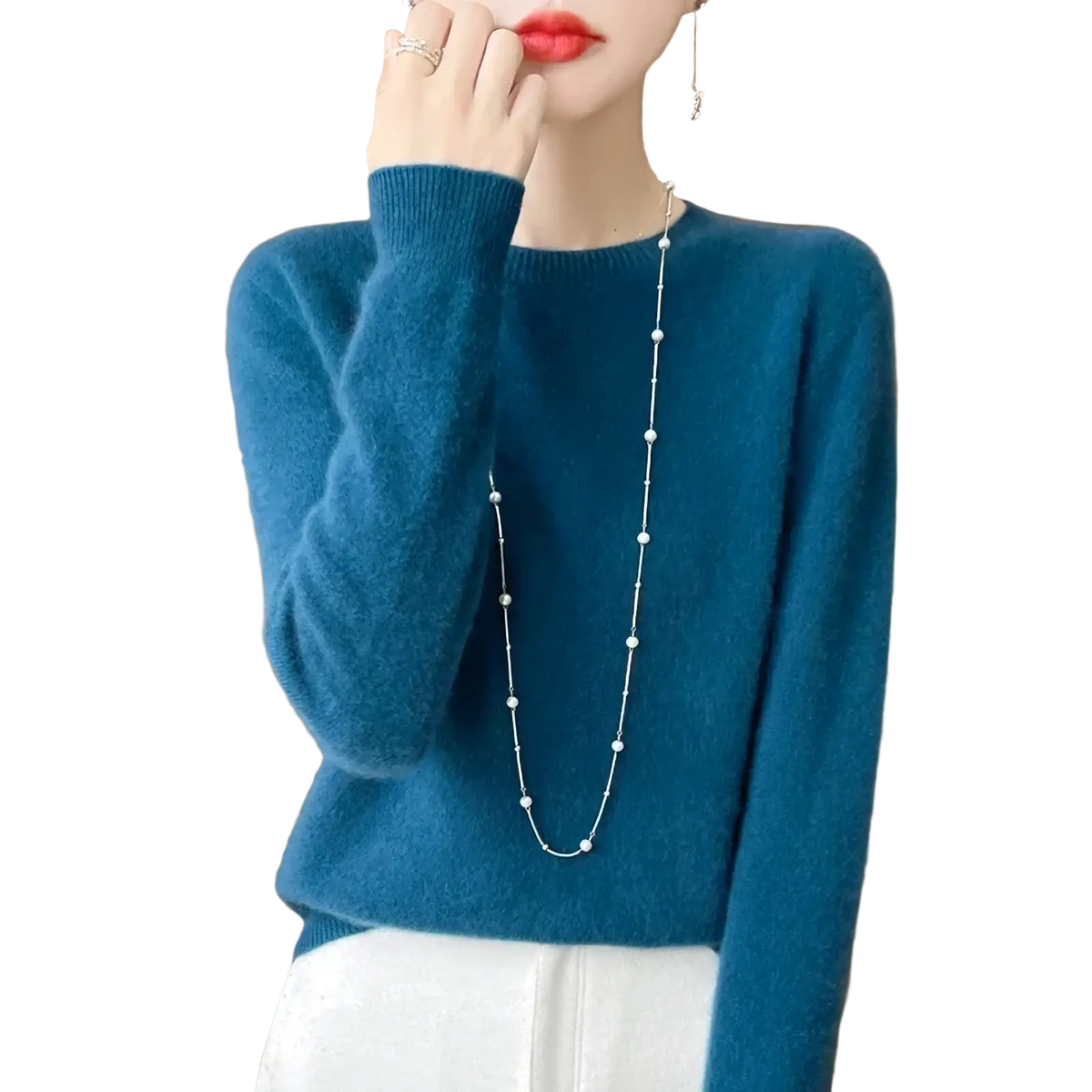 A soft teal merino wool sweater for women with an o-neck and long sleeves in a pullover style