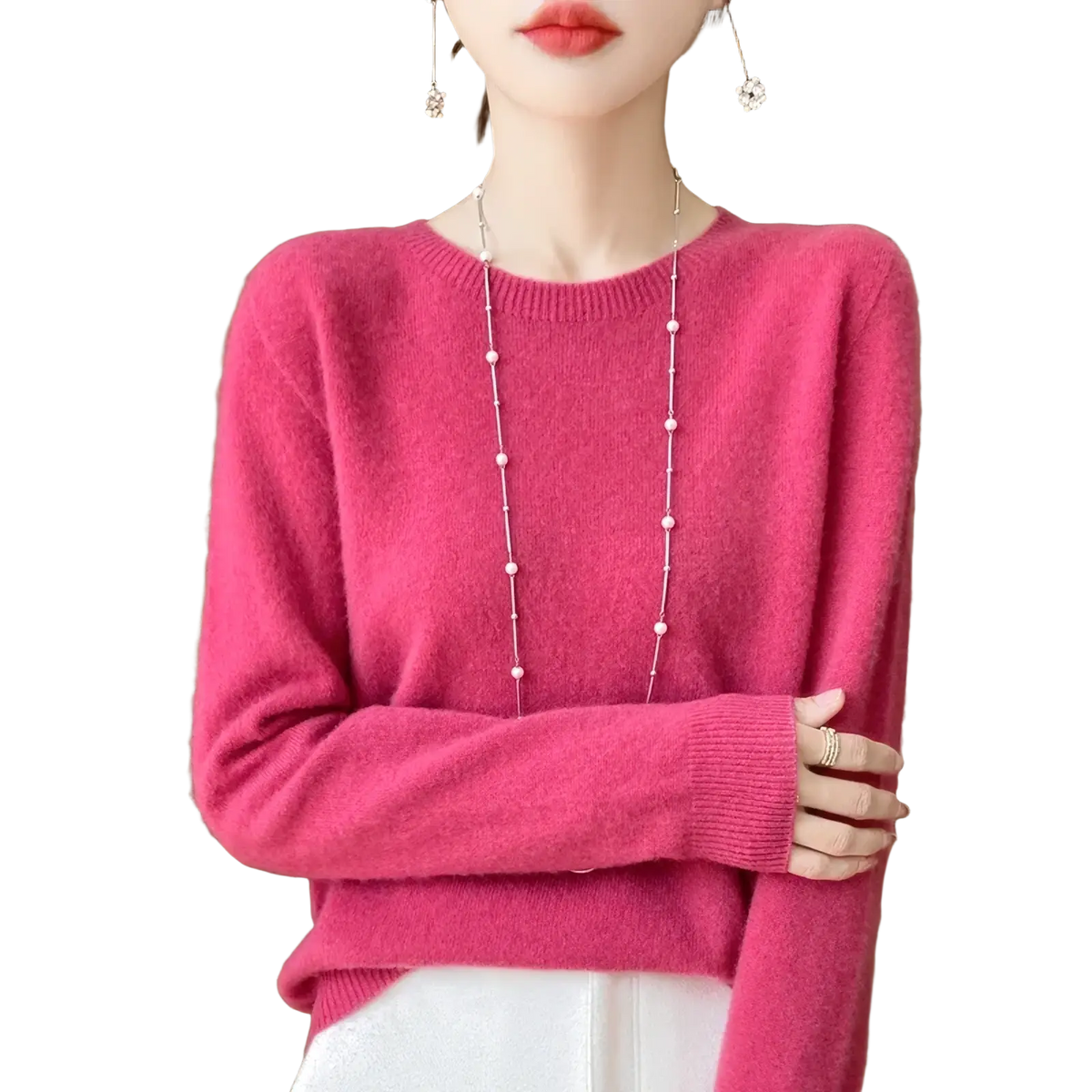 A soft vibrant pink merino wool sweater for women with an o-neck pullover design and ribbed cuffs
