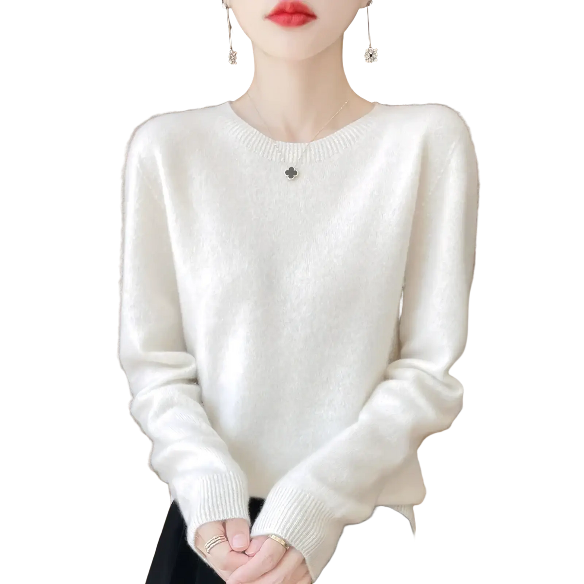 A soft off-white merino wool sweater for women with o-neck and ribbed cuffs designed as a pullover