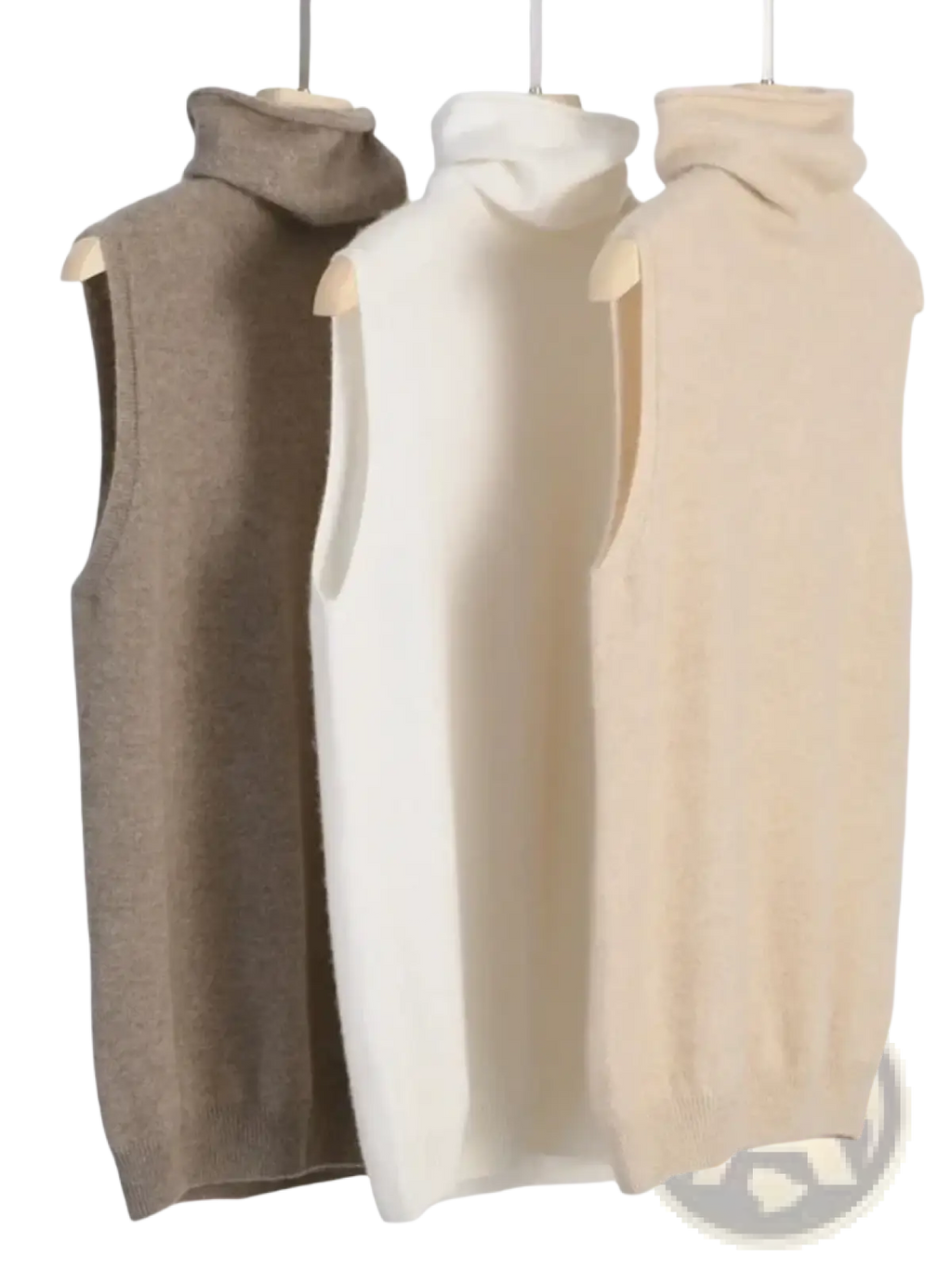 Three sleeveless merino wool turtleneck knit vests in beige cream and taupe displayed on wooden hangers