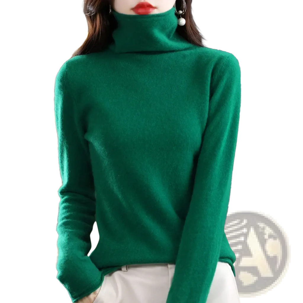 A rich emerald green merino wool turtleneck sweater for women featuring long sleeves and soft knit fabric
