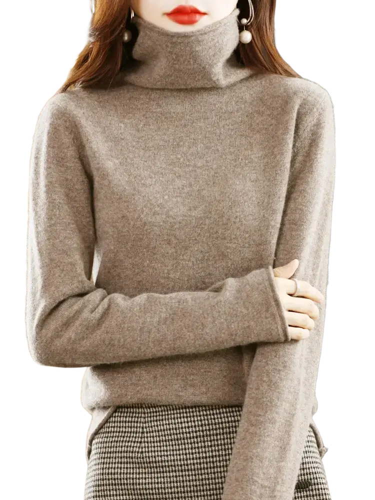 A soft light gray merino wool turtleneck sweater for women with a cozy knit texture and long sleeves
