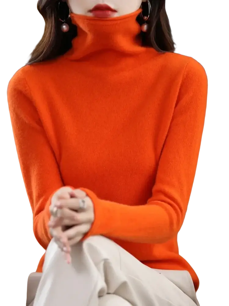 A vibrant orange merino wool turtleneck sweater for women with a soft knit texture and high neck design