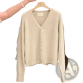 Merino wool v-neck cardigan sweater in soft off-white with long sleeves and button-front closure