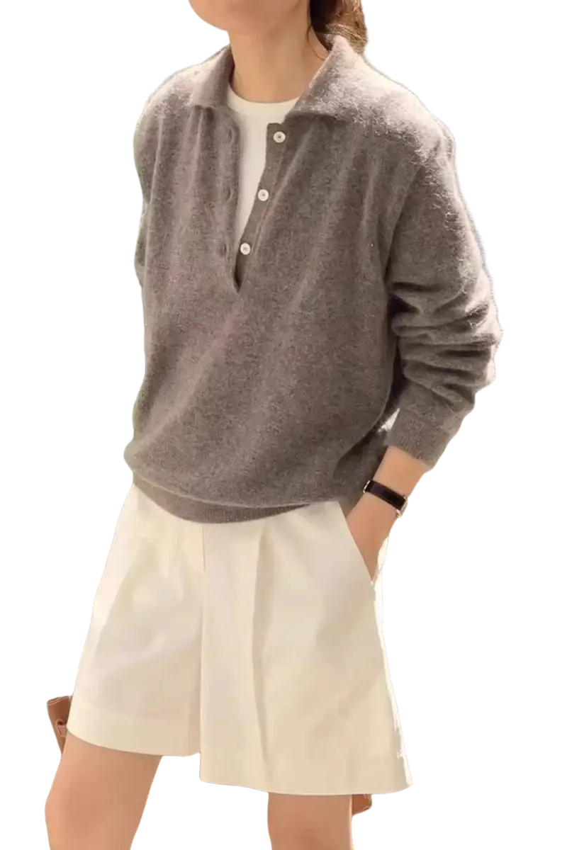 A soft gray fuzzy knit merino wool polo sweater with collar and button closure for women