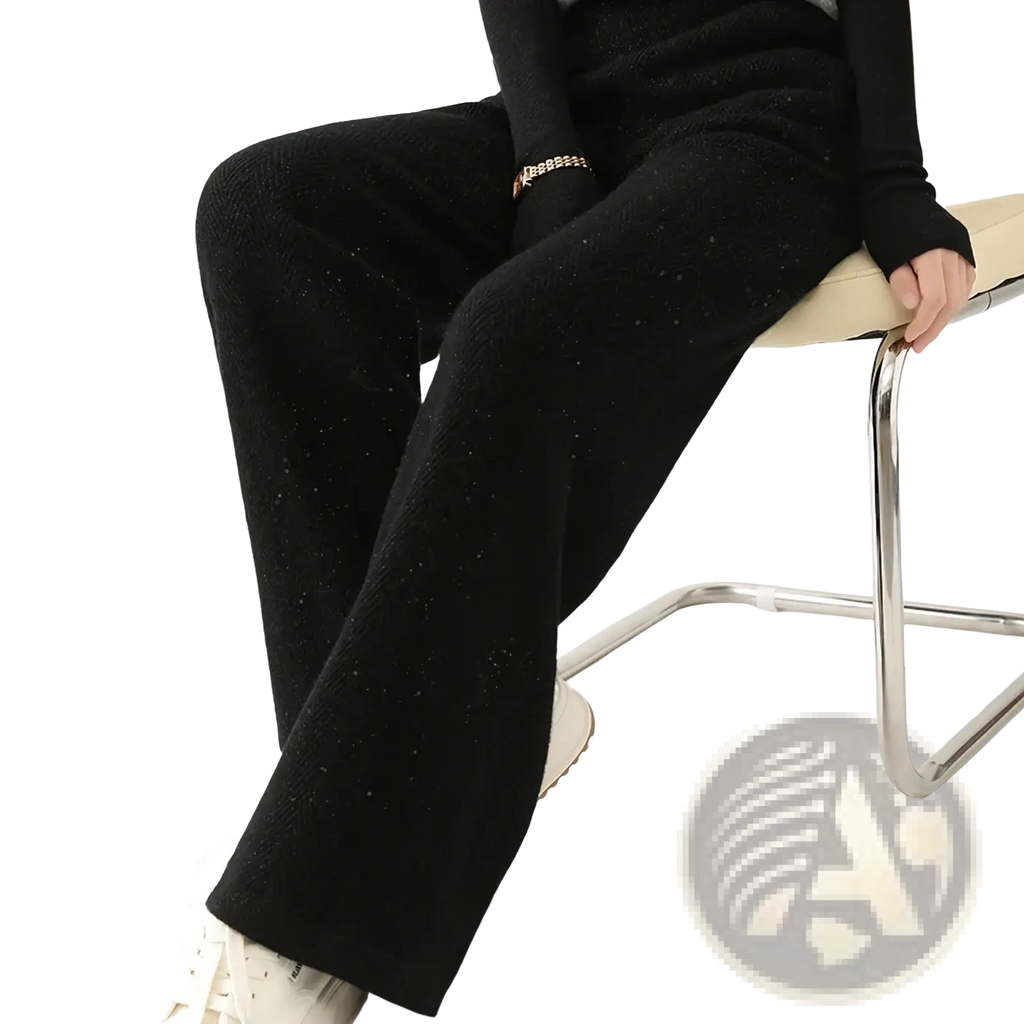 Black merino wool wide leg pants with a subtle shimmering knit texture for elegant comfort and style