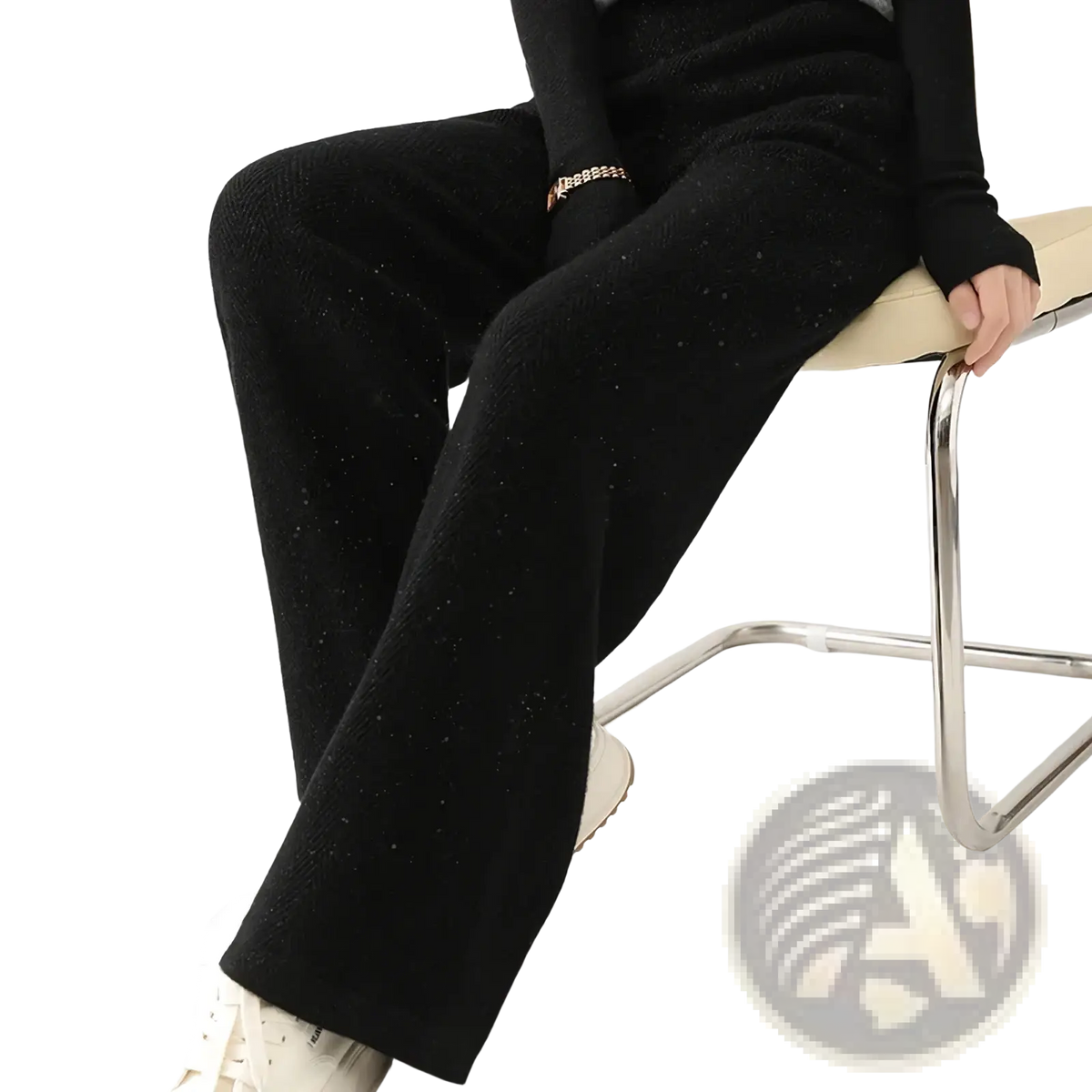 Black merino wool wide leg pants with a subtle shimmering knit texture for elegant comfort and style