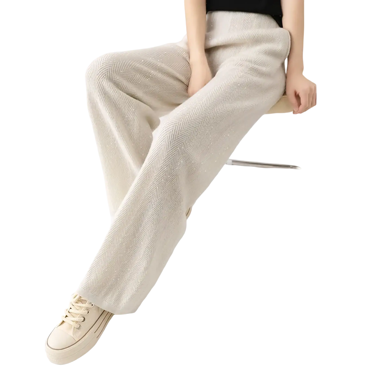Cream-colored merino wool wide leg pants with a subtle herringbone weave and sparkling texture