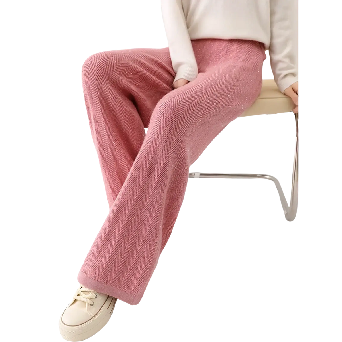 Soft pink merino wool wide leg pants with a cozy herringbone knit texture and relaxed silhouette