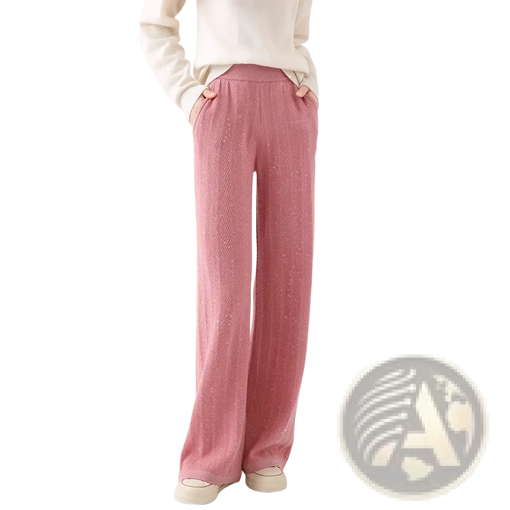 Soft pink merino wool wide leg pants with subtle textured weave and comfortable elastic waistband