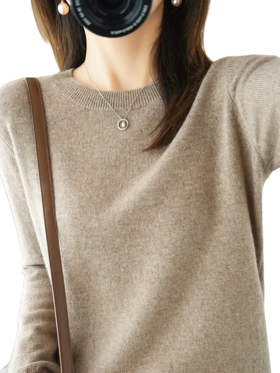 Beige merino wool women casual pullover sweater with long sleeves ribbed crew neckline and subtle texture