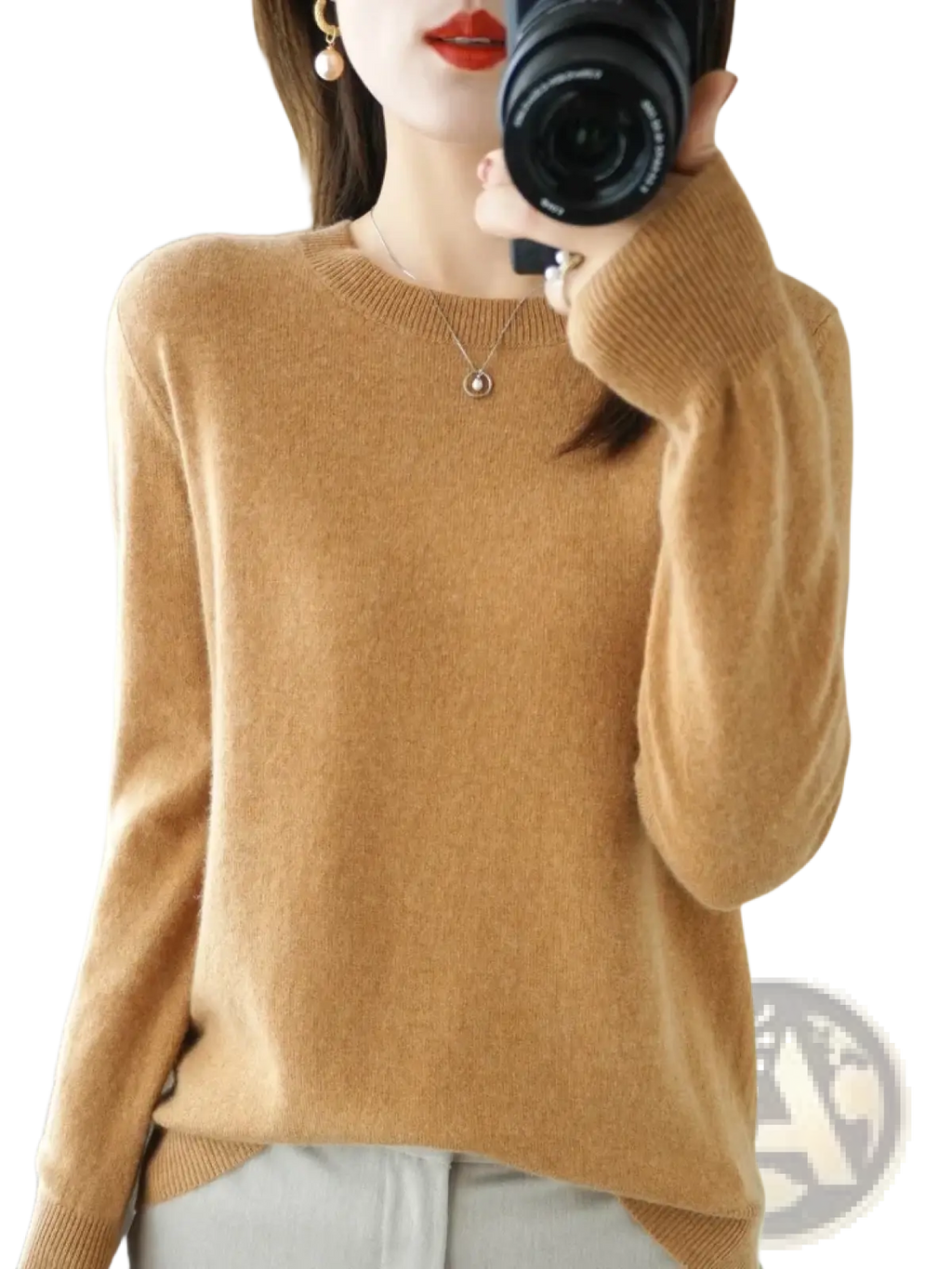 A camel-colored soft cashmere sweater with round neckline and ribbed cuffs for women casual wear