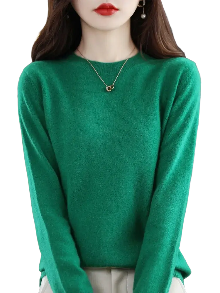 A soft emerald green cashmere sweater with round neckline and long sleeves for women’s casual wear